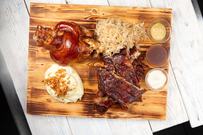 Traditional German Beer Snacks. Shank, Stewed Cabbage, Fried Ribs