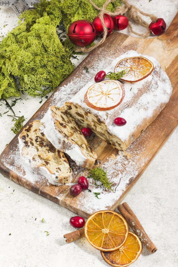 Traditional German Christmas Cake with Raisins and Marzipan. Sliced