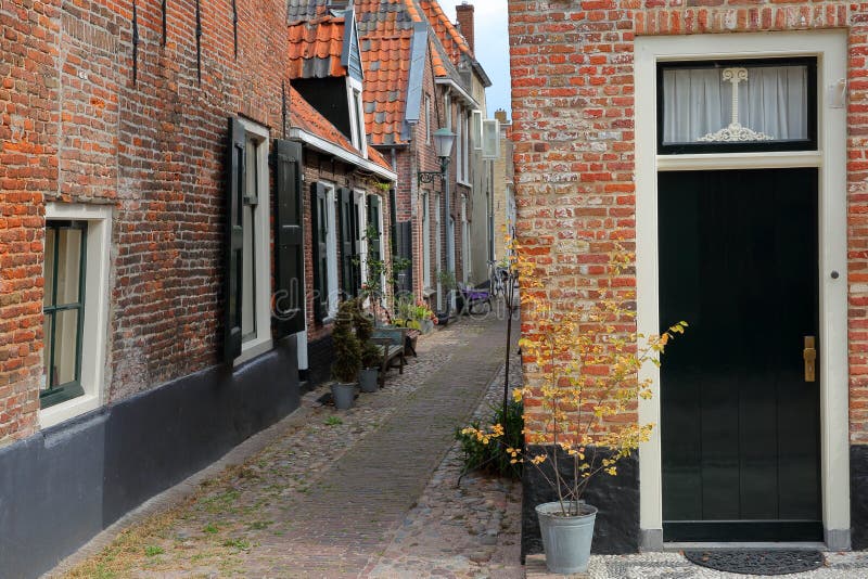 Traditional Historic Medieval Houses in the Old Picturesque Fortified Town  of Elburg Stock Photo - Image of colorful, pavement: 254378576