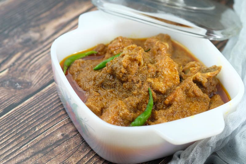 Traditional Indian Curry Lamb Masala in a Bowl on Table Stock Image