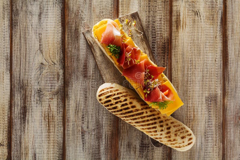 Traditional Italian Sandwich with Ham and Cheese Served Warm Stock