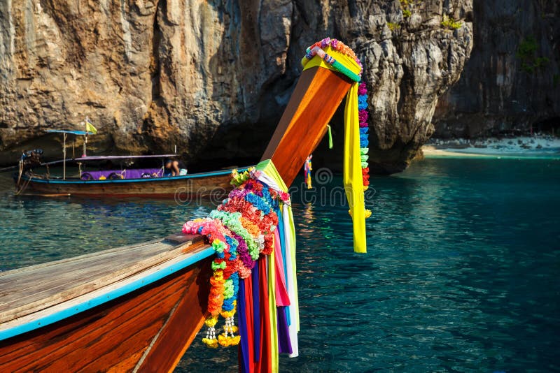 Traditional longtail boat on the way to famous Maya Bay beach in Koh Phi Phi Island, Thailand royalty free stock photography Traditional longtail boat on the way to famous Maya Bay beach in Koh Phi Phi Island, Thailand royalty free stock photography