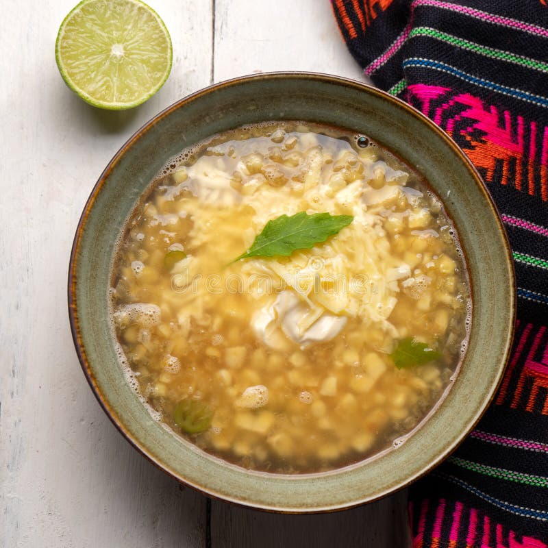 Mexican Corn Grain Boiled Also Called Esquites with Cheese and Mayonnaise on White Background