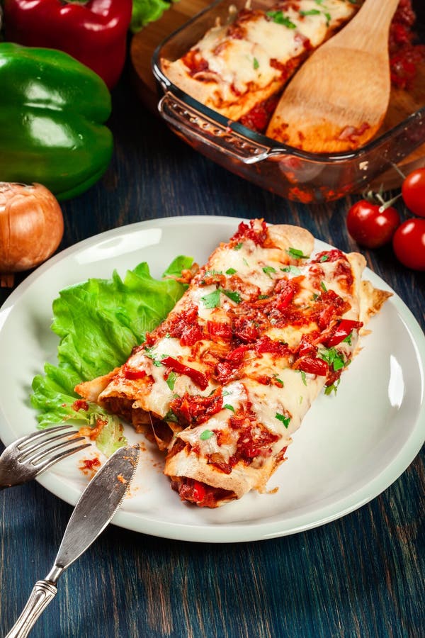 Traditional Mexican Enchiladas with Chicken Meat, Spicy Tomato Sauce ...