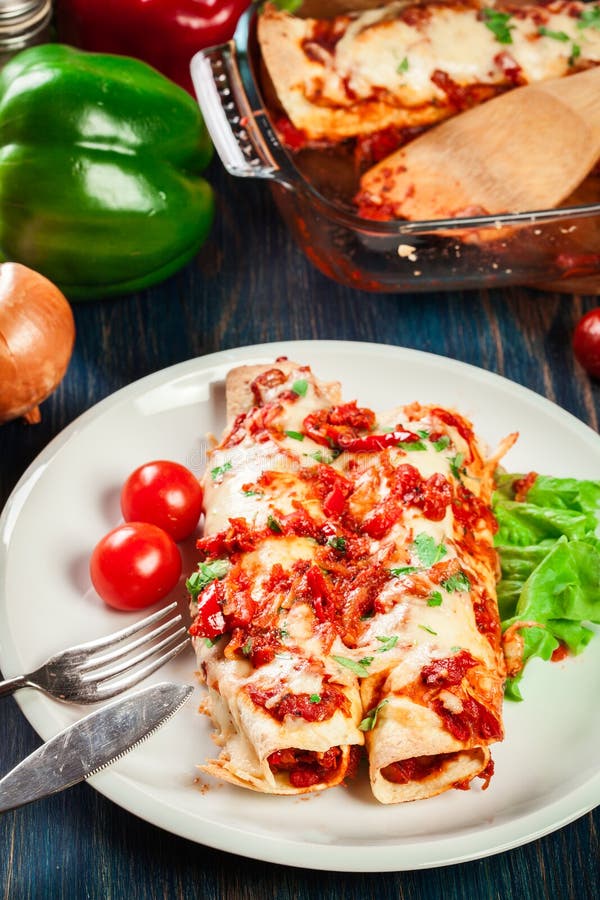 Traditional Mexican Enchiladas with Chicken Meat, Spicy Tomato Sauce ...