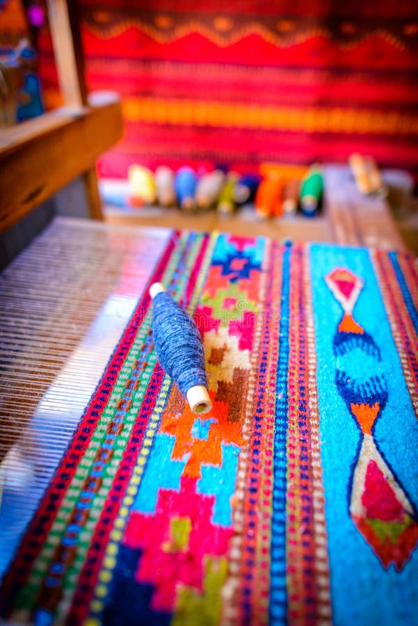 Traditional mexican weaving on a loom stock image