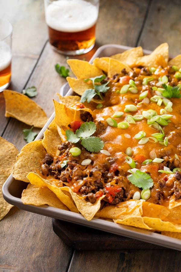 Traditional Nachos with Ground Beef and Red Pepper Stock Photo Image