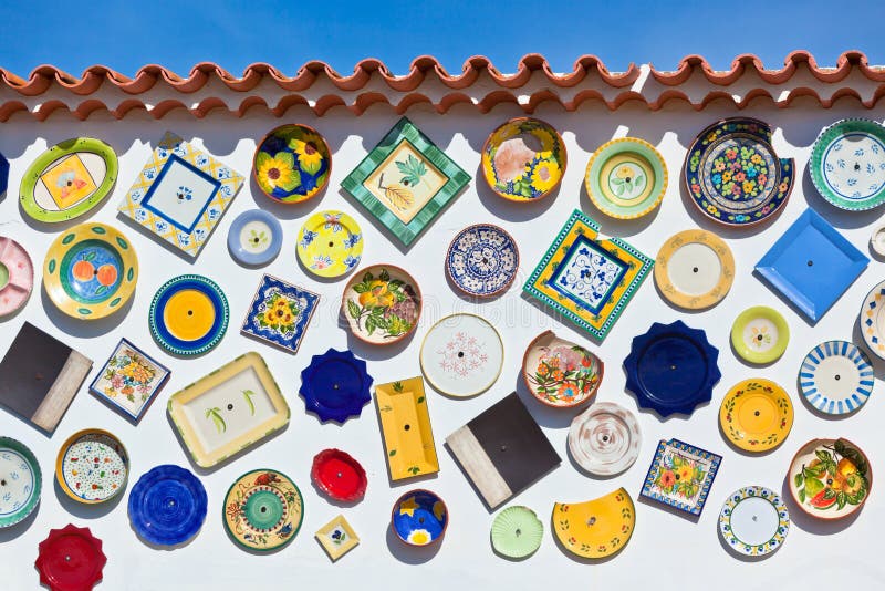 Traditional portuguese pottery plates on a wall in Algarve royalty free stock image Traditional portuguese pottery plates on a wall in Algarve royalty free stock image