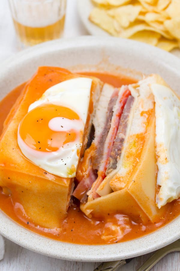 Traditional Portuguese Sandwich with Sauce Francesinha on Dish Stock ...