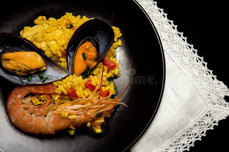 Traditional Rice in Paella with Fish and Meat. Stock Image Image of