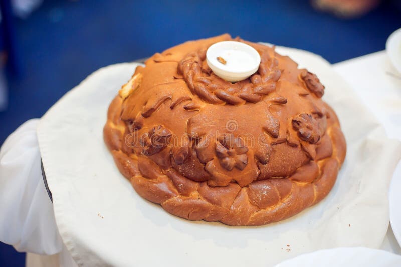 A Traditional Ritual of Offering Bread and Salt To a Guest