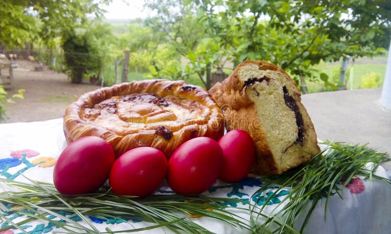 Traditional Romanian pasca, sweetbread, and Easter eggs