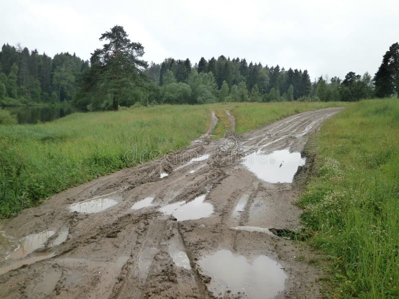 Traditional Russian Countryside Landscape with Dirty Russian Roads.  Puddles, Dirt, Bumps and Bumps. Stock Photo - Image of countryside, broken:  186047656