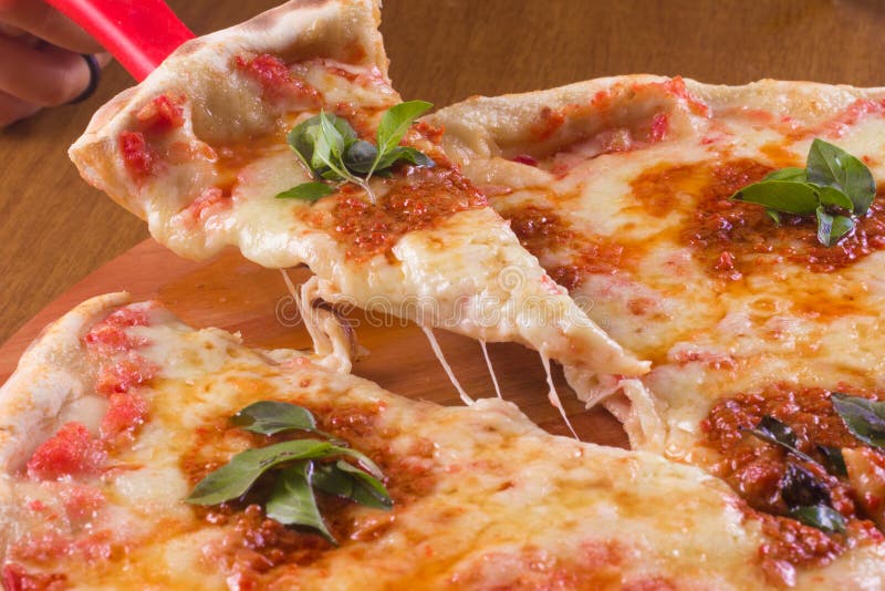 Pizza siciliana (pizza with sardines), … – License Images – 856514 ❘  StockFood