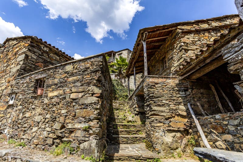 Candal – Nestled Among the Mountains. Traditional schist architecture in the village of Candal, nestled in the Lousa Mountain Range, Coimbra, Portugal royalty free stock image Candal – Nestled Among the Mountains. Traditional schist architecture in the village of Candal, nestled in the Lousa Mountain Range, Coimbra, Portugal royalty free stock image
