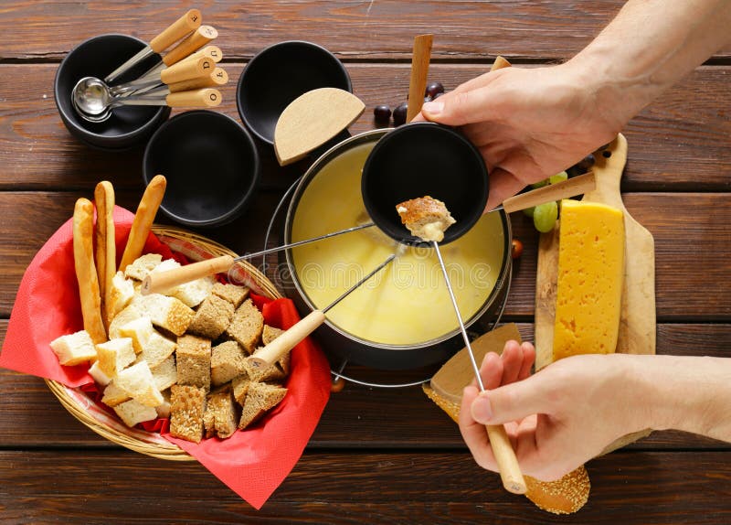 Traditional Set of Utensils for Fondue, with Bread, Cheese Stock Photo Image of baguette