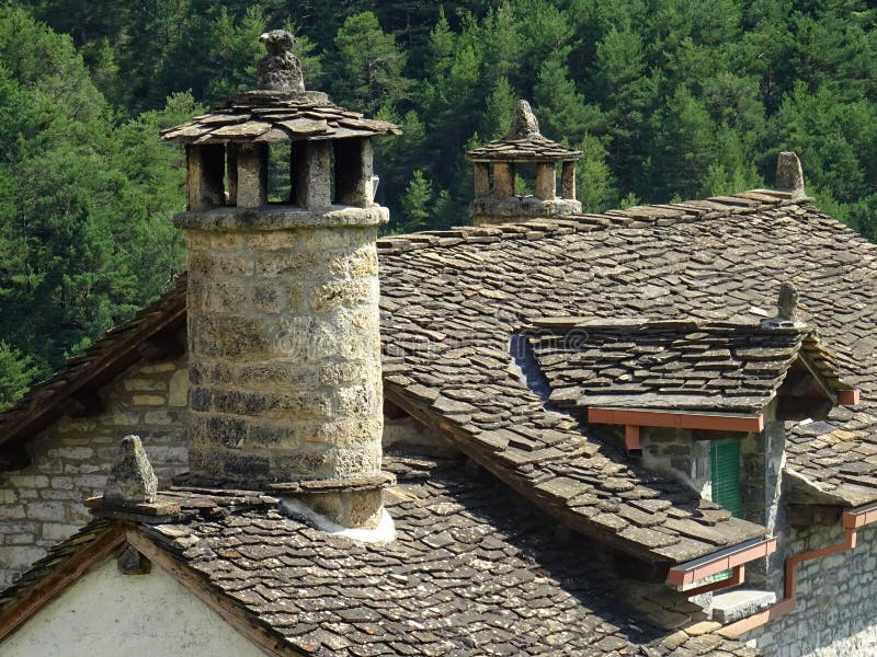 Traditional slate architecture in the town of Oliván. Detail of roofs and chimneys. Pyrenees Mountains. Aragon. Spain. Typical architectures stock images, royalty-free photos and pictures