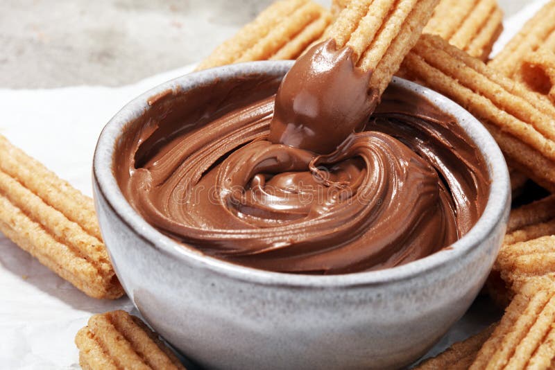 Traditional Spanish Dessert Churros with Sugar and Chocolate Stock