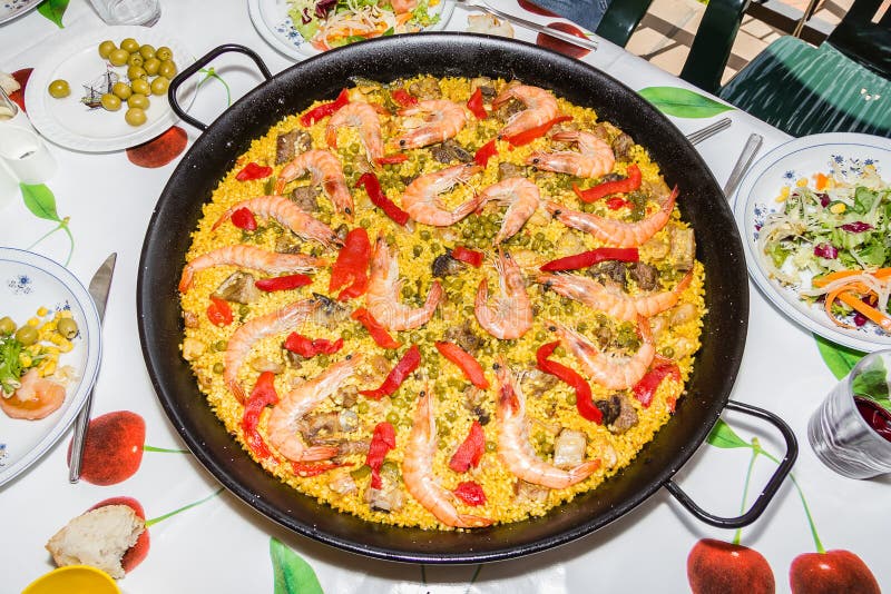 Traditional Spanish Paella Cooked in a Pan Stock Photo Image of fish