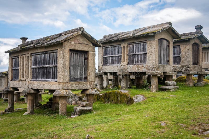 Traditional 18th century granite grain stores (espigueiros). They are designed to let the wind in but keep pests out. Lindoso, Minho, Portugal. Traditional 18th century granite grain stores (espigueiros). They are designed to let the wind in but keep pests out. Lindoso, Minho, Portugal.