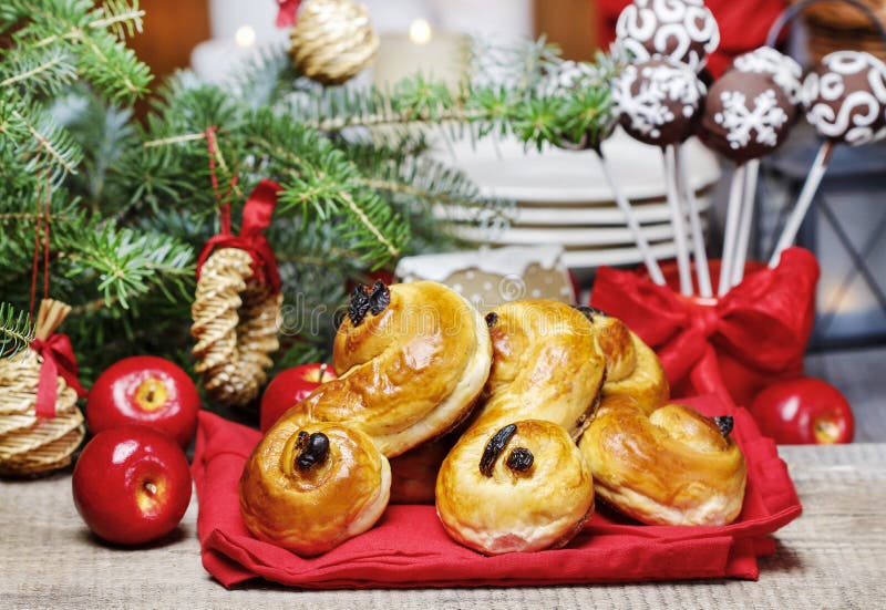 Traditional swedish buns in christmas setting. A saffron bun, royalty free stock photos Traditional swedish buns in christmas setting. A saffron bun, royalty free stock photos