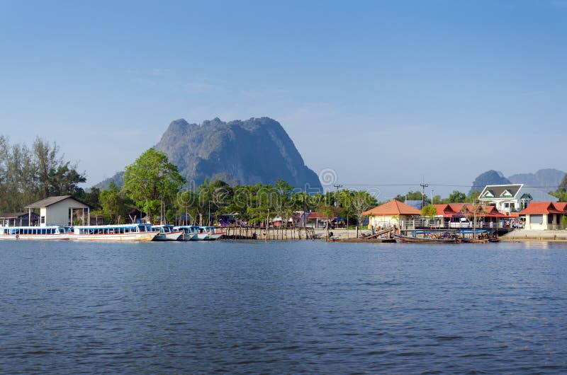 Traditional Thai Tourist boats at pier stock images Traditional Thai Tourist boats at pier stock images