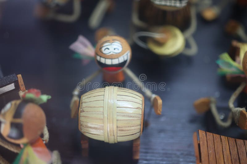 Traditional Thai wooden doll Show gestures, play music, beat drums, pastel background royalty free stock photos Traditional Thai wooden doll Show gestures, play music, beat drums, pastel background royalty free stock photos