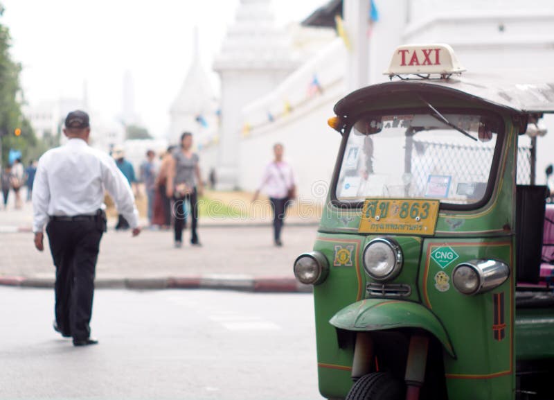 Traditional three-wheels THAI open air fun and well known BANGKOK and urban taxi royalty free stock images Traditional three-wheels THAI open air fun and well known BANGKOK and urban taxi royalty free stock images