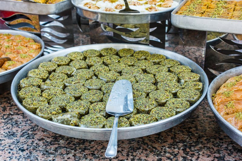 Traditional Turkish baklava sweets in the open buffet in a hotel in Turkey stock photos