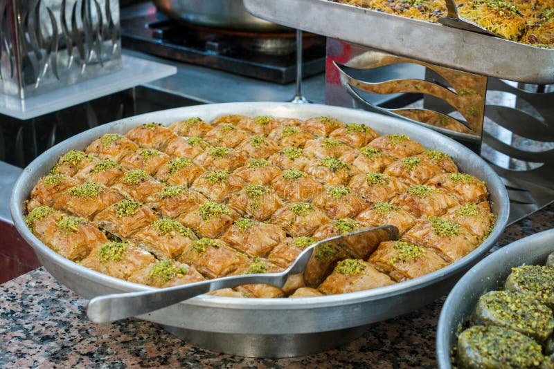 Traditional Turkish baklava sweets in the open buffet in a hotel in Turkey royalty free stock image