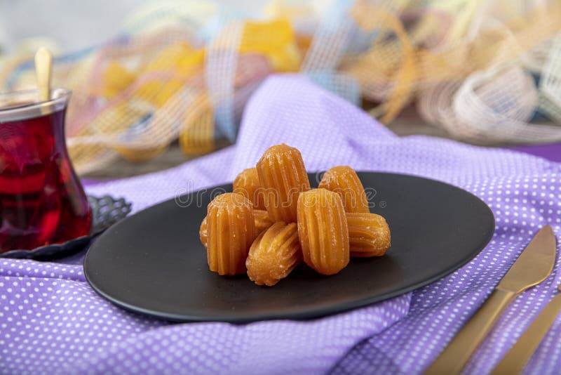 Traditional Turkish Dessert Tulumba, Tulumba Tatlisi in a Plate Served ...