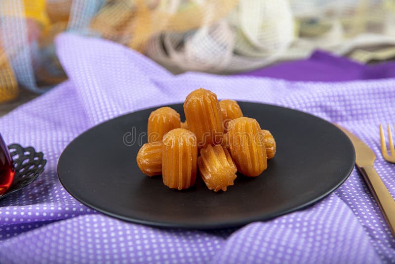 Traditional Turkish Dessert Tulumba, Tulumba Tatlisi in a Plate Served ...