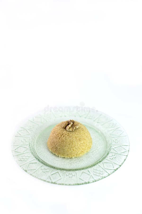 Traditional Turkish semolina sweet desert halva-irmik helvasi with nuts