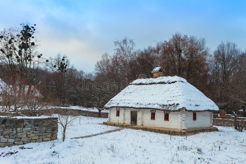 Traditional Ukrainian village in winter. Old house at Pirogovo ethnographic museum