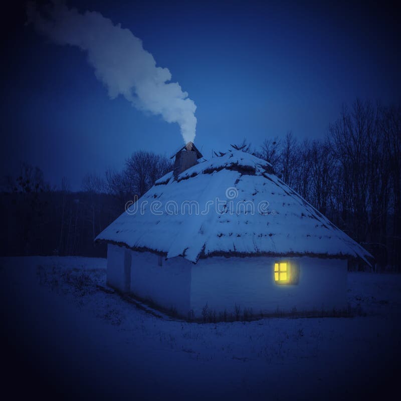 Traditional Ukrainian village in winter. Old house at Pirogovo ethnographic museum