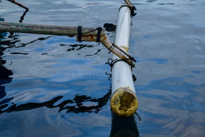 Traditional wings fishing wooden boat parked near pahawang island. Traveling concept stock photos Traditional wings fishing wooden boat parked near pahawang island. Traveling concept stock photos
