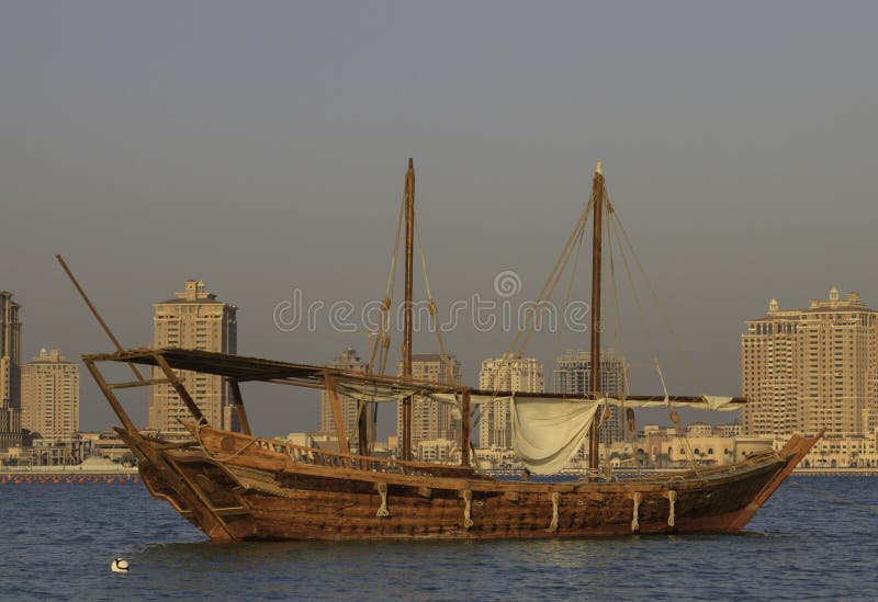 Wooden dhow boat in Qatar stock photo. Image of coastal 