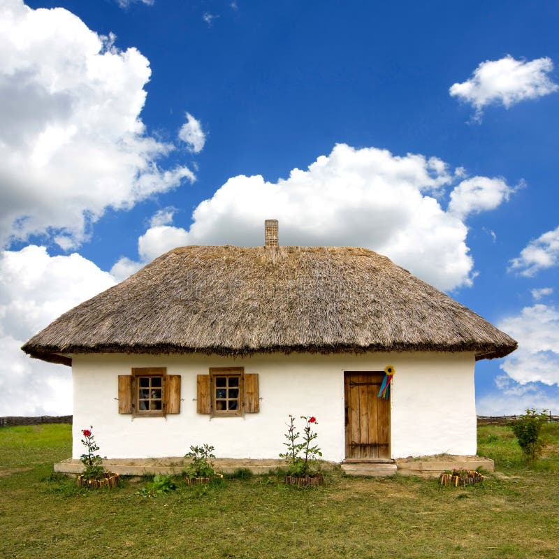 Traditional ukrainian rural house on nice sky background. Traditional ukrainian rural house on nice sky background