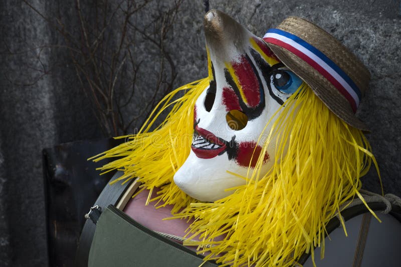 Basel - Switzerland - 9 March 2022 - Closeup of traditionl mask at the famous carnival in the street. Basel - Switzerland - 9 March 2022 - Closeup of traditionl mask at the famous carnival in the street