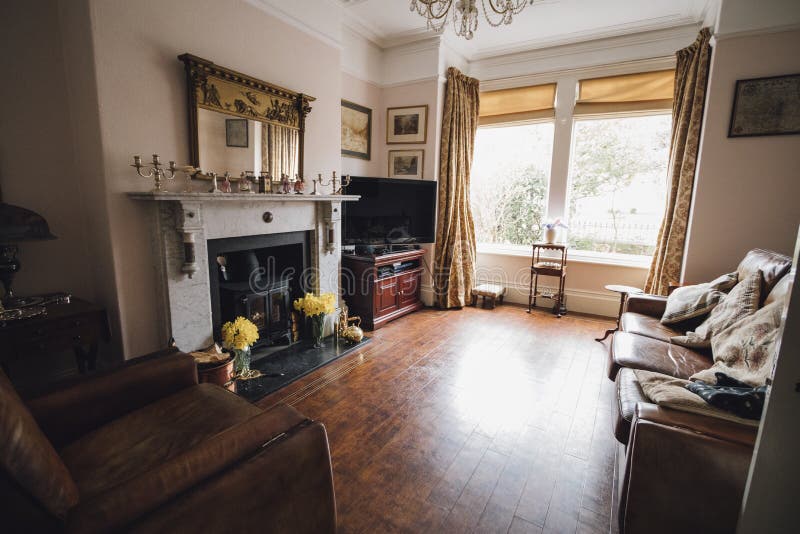 Empty room shot of a traditionally British, elderly couple`s living room. Empty room shot of a traditionally British, elderly couple`s living room.