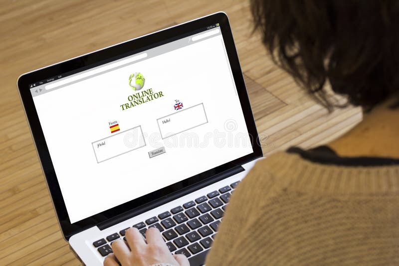 Translation concept: online translator on a laptop screen. Screen graphics are made up. Translation concept: online translator on a laptop screen. Screen graphics are made up.
