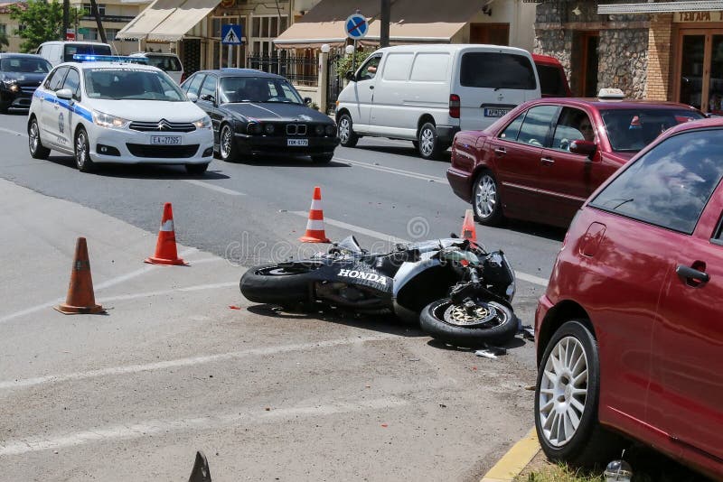 Argolida, Greece - May 15, 2016: traffic accident between a car and a motorcycle large displacement on country roads