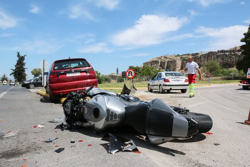 Argolida, Greece - May 15, 2016: traffic accident between a car and a motorcycle large displacement on country roads