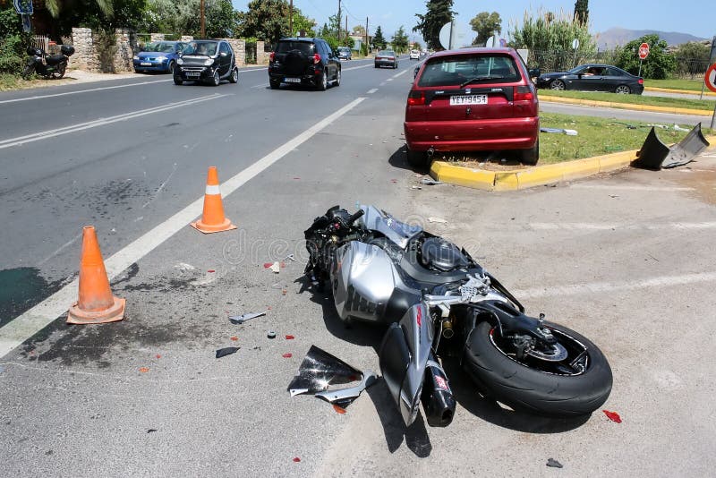 Argolida, Greece - May 15, 2016: traffic accident between a car and a motorcycle large displacement on country roads