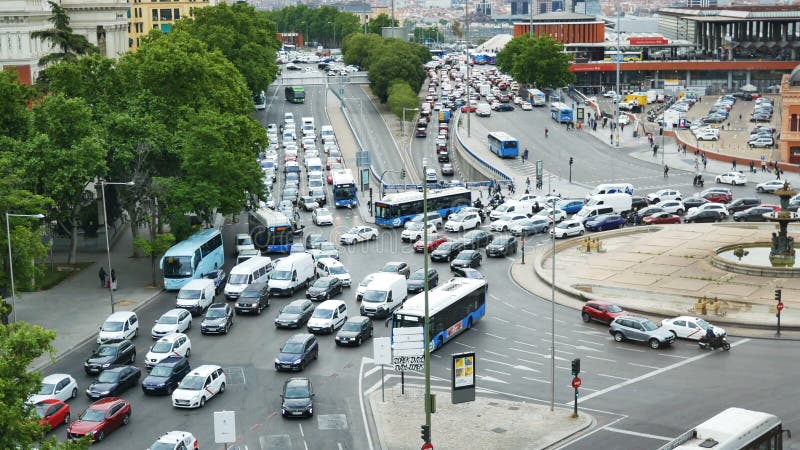 Traffic Jam roundabout full of vehicles in Madrid Square Atocha 4k footage