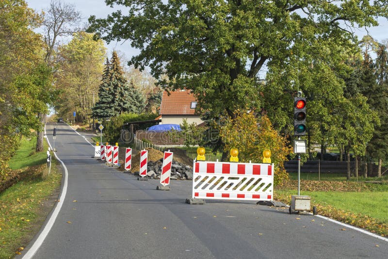 A Traffic Light at a Construction Site Shows Stop Stock Image Image