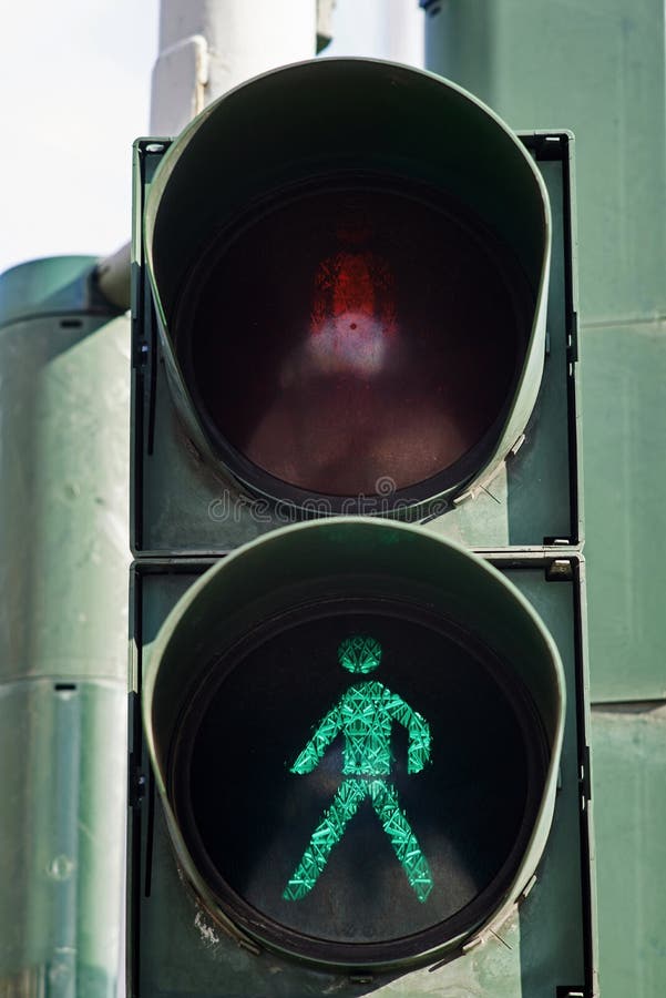 Traffic Light with the Green Man Sympol. Stock Image Image of sign