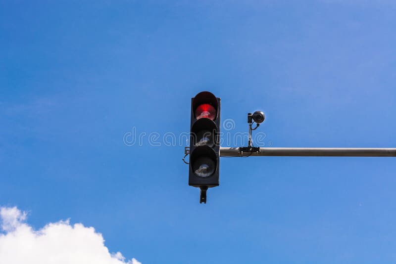 Traffic Light and a Surveillance Camera Stock Photo Image of green