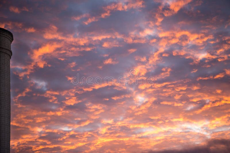 Pastel Pink And Yellow Sunrise Clouds In Blue Sky Stock Photo Image