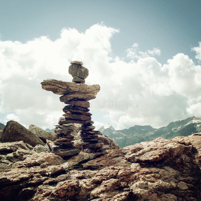 Trail Sign. Man like stone pyramid. Caucasus Mountains vintage e